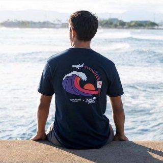 Man wearing shirt with neon The Wave design